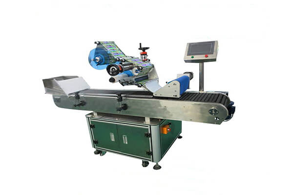 Horizontal labeling machine for tubes and small bottles